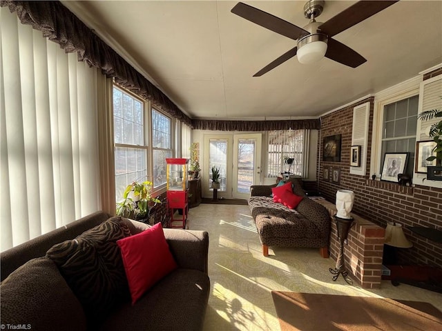 sunroom / solarium with ceiling fan