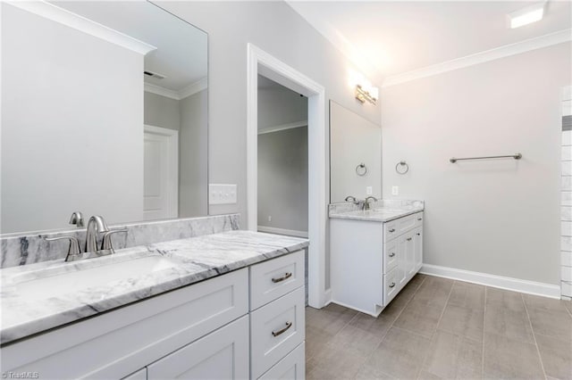 bathroom with vanity and crown molding