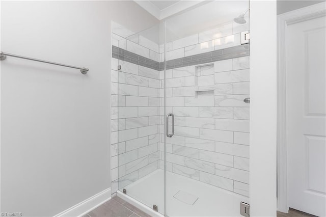 bathroom featuring tile patterned floors and a shower with door