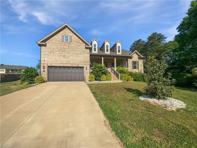 view of front of property with a garage, a front lawn, brick siding, and driveway