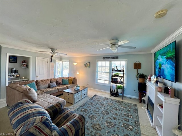 living room featuring ornamental molding and ceiling fan