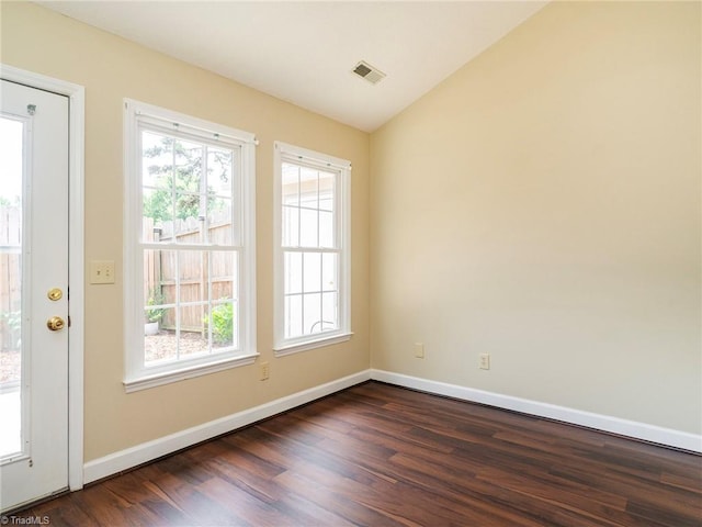 10 Cedar Knoll Ct, Greensboro, NC 27407 - spare room featuring dark wood-style flooring and lofted ceiling
