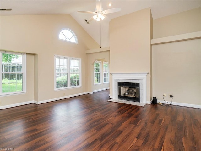10 Cedar Knoll Ct, Greensboro, NC 27407 - unfurnished living room with wood finished floors, healthy amount of natural light, a ceiling fan, and high vaulted ceiling