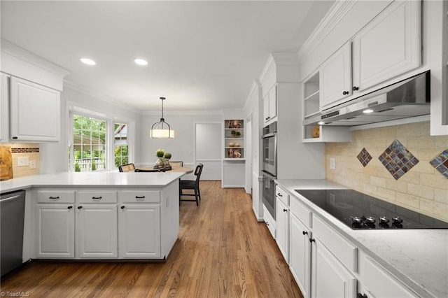3408 Deep Green Dr, Greensboro, NC 27410 - kitchen featuring under cabinet range hood, appliances with stainless steel finishes, white cabinetry, light countertops, and crown molding