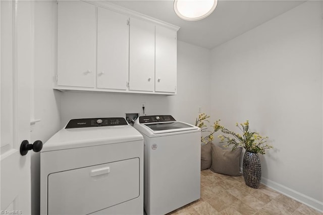 3408 Deep Green Dr, Greensboro, NC 27410 - washroom featuring washing machine and dryer, cabinet space, and baseboards