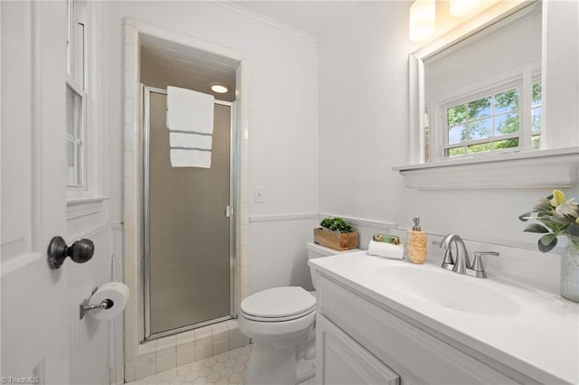 3408 Deep Green Dr, Greensboro, NC 27410 - full bathroom with a stall shower, vanity, a wainscoted wall, toilet, and ornamental molding