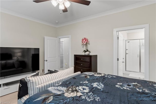 bedroom with ensuite bath, ceiling fan, and crown molding