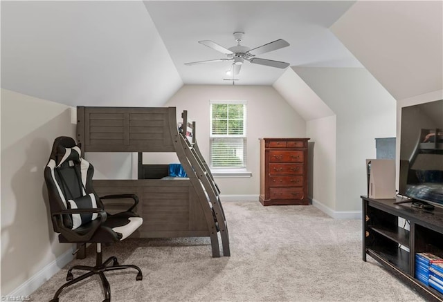 bedroom featuring ceiling fan, light colored carpet, and lofted ceiling