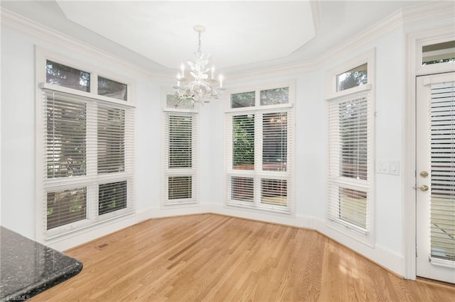 1000 Brookmeade Dr, Winston-Salem, NC 27106 - unfurnished dining area featuring a chandelier, light wood-style floors, and ornamental molding
