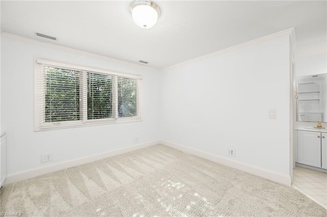 1000 Brookmeade Dr, Winston-Salem, NC 27106 - unfurnished room featuring crown molding and light colored carpet