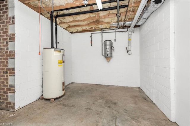 1000 Brookmeade Dr, Winston-Salem, NC 27106 - unfinished below grade area with water heater and a central vacuum unit