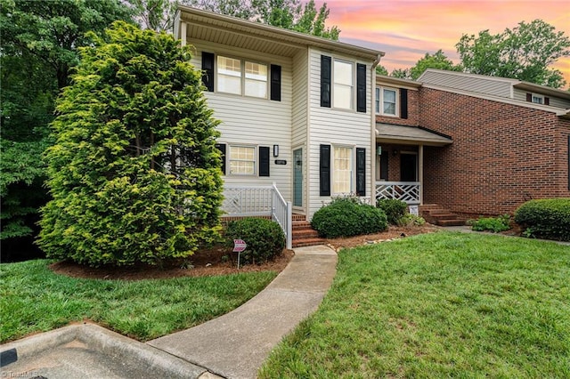 1896 Winds Dr, Winston-Salem, NC 27127 - view of front of property featuring a lawn and a porch