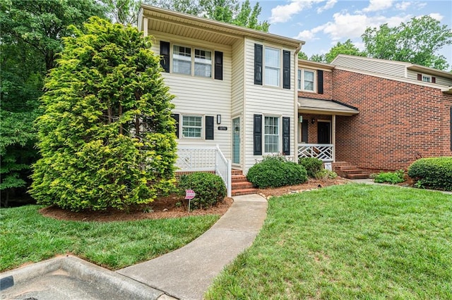 1896 Winds Dr, Winston-Salem, NC 27127 - view of front facade with a front lawn