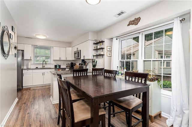 1896 Winds Dr, Winston-Salem, NC 27127 - dining space with dark wood-type flooring