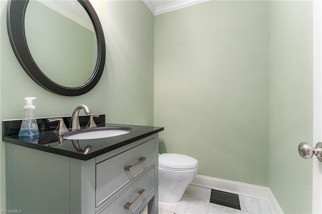 half bathroom with marble finish floor, visible vents, toilet, vanity, and baseboards