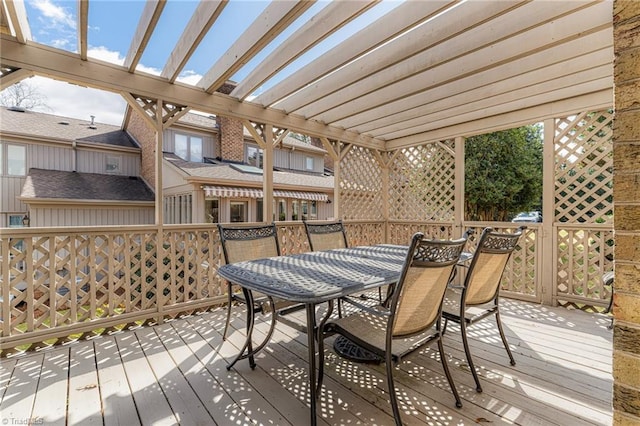 wooden deck with outdoor dining area