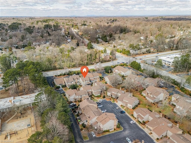 birds eye view of property with a residential view