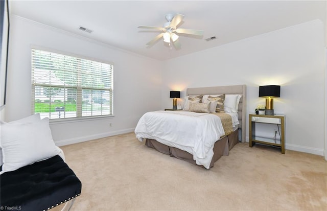 4294 Plantation Ridge Ln, Greensboro, NC 27409 - bedroom with ornamental molding, light colored carpet, and ceiling fan