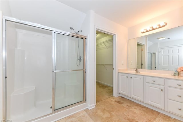 4294 Plantation Ridge Ln, Greensboro, NC 27409 - full bath with a stall shower, vanity, and a spacious closet