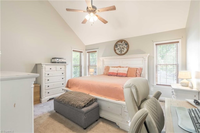 bedroom featuring high vaulted ceiling, multiple windows, ceiling fan, and light colored carpet