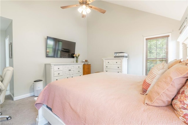 bedroom featuring carpet floors, a ceiling fan, baseboards, and high vaulted ceiling
