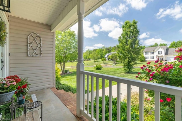 balcony featuring a porch