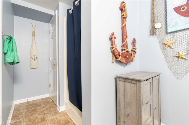 corridor with baseboards