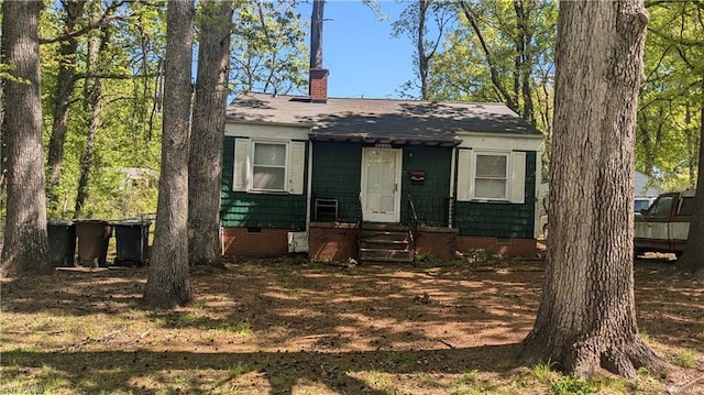 2806 Robin Hood Dr, Greensboro, NC 27408 - view of front facade with crawl space and a chimney