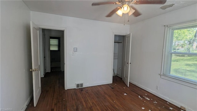 2806 Robin Hood Dr, Greensboro, NC 27408 - unfurnished bedroom with baseboards, wood finished floors, and visible vents