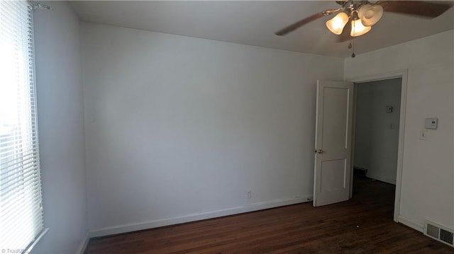 2806 Robin Hood Dr, Greensboro, NC 27408 - spare room with baseboards, wood finished floors, visible vents, and ceiling fan