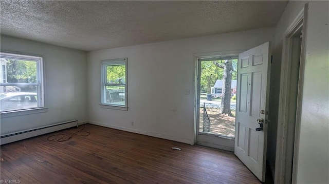 2806 Robin Hood Dr, Greensboro, NC 27408 - interior space with wood finished floors, a textured ceiling, and a healthy amount of sunlight