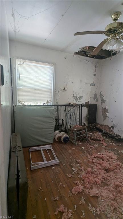 2806 Robin Hood Dr, Greensboro, NC 27408 - unfurnished room with wood-type flooring and a ceiling fan