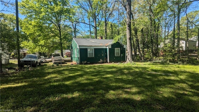 2806 Robin Hood Dr, Greensboro, NC 27408 - view of yard with fence and an outbuilding