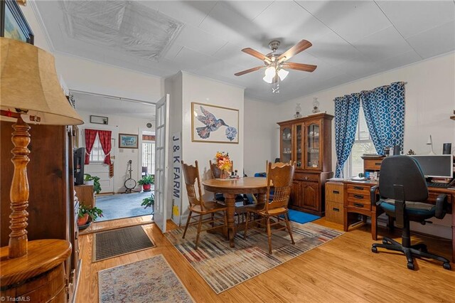 dining room featuring ceiling fan and light hardwood / wood-style floors