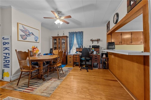 dining space featuring ceiling fan and light hardwood / wood-style floors