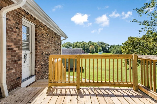 deck featuring a yard