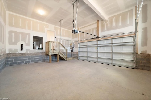 garage featuring a garage door opener