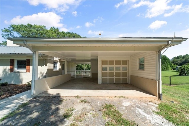 view of parking / parking lot with a lawn and a carport