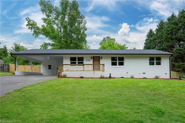 6795 Vance Rd, Kernersville, NC 27284 - single story home with asphalt driveway, a carport, and covered porch