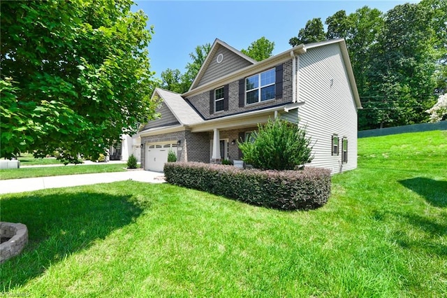 view of front of house featuring a front yard and a garage