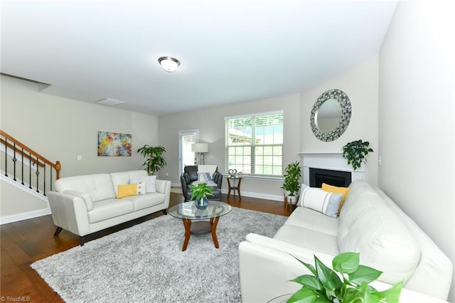 living room with dark wood-type flooring