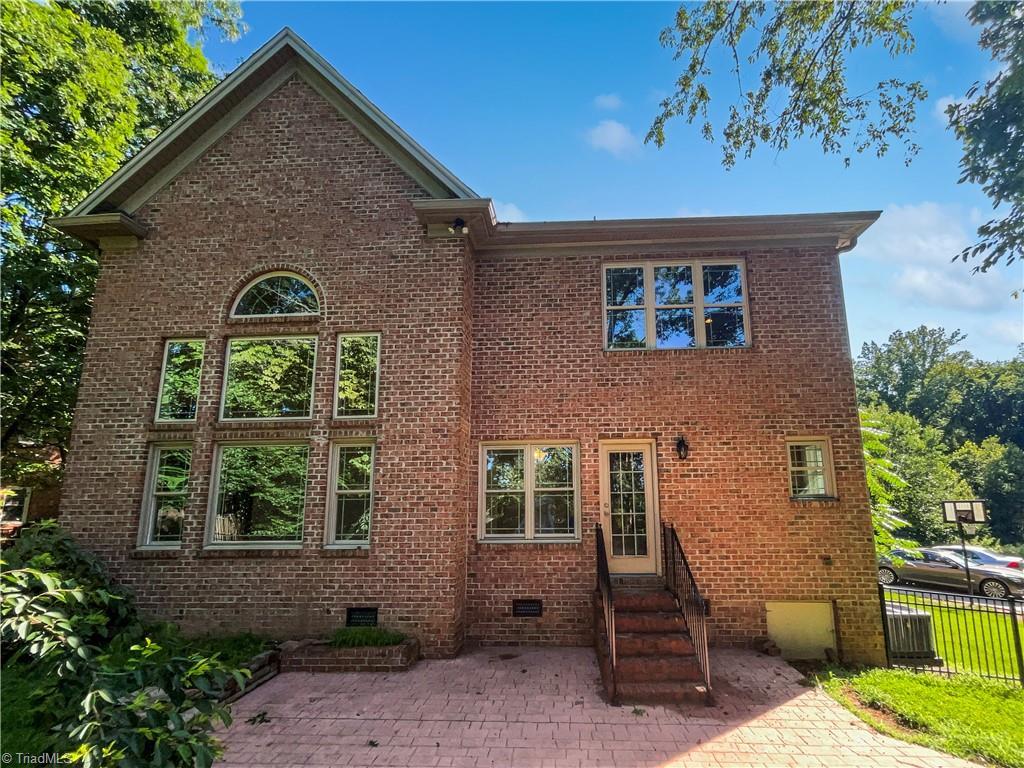 350 Bent Creek Trl, Kernersville, NC 27284 - rear view of house with crawl space, a patio area, brick siding, and entry steps