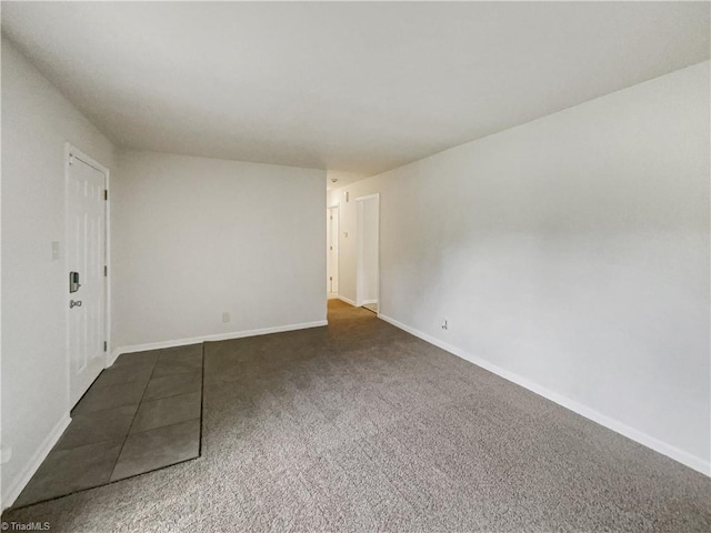 1606 Woodbriar Ave, Greensboro, NC 27405 - unfurnished room featuring carpet flooring and baseboards