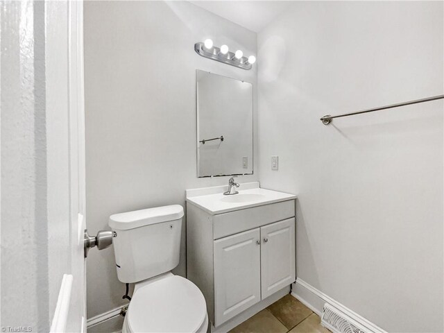1606 Woodbriar Ave, Greensboro, NC 27405 - bathroom with vanity and tile patterned flooring