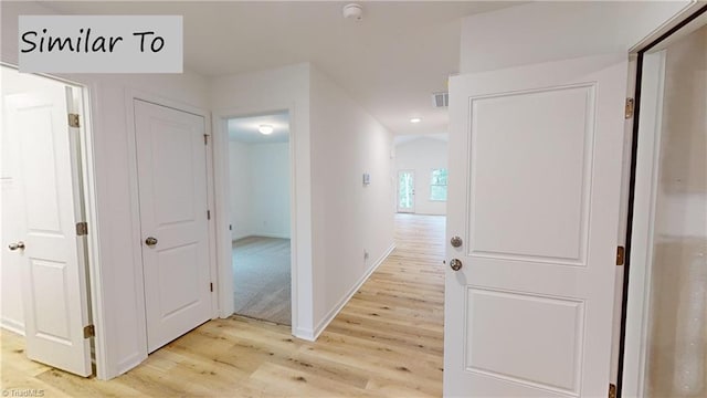 hallway featuring light hardwood / wood-style floors