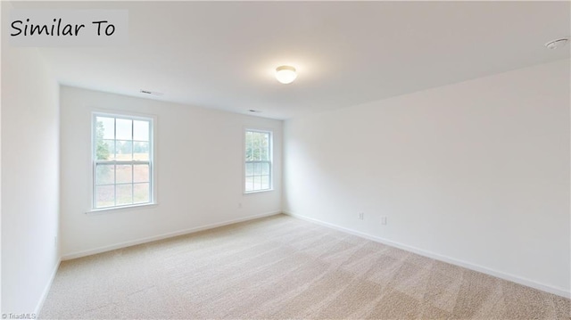 view of carpeted spare room