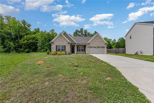 275 Obsidium Ct, Gibsonville, NC 27249 - view of front of house with concrete driveway, an attached garage, and brick siding