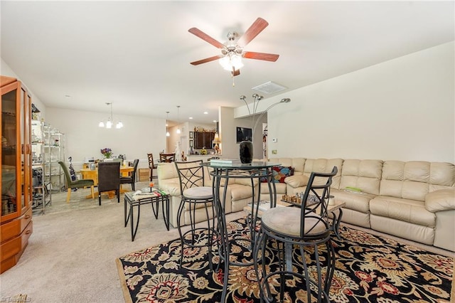 275 Obsidium Ct, Gibsonville, NC 27249 - living room featuring a ceiling fan, light carpet, and a chandelier