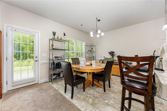 275 Obsidium Ct, Gibsonville, NC 27249 - dining space featuring a chandelier