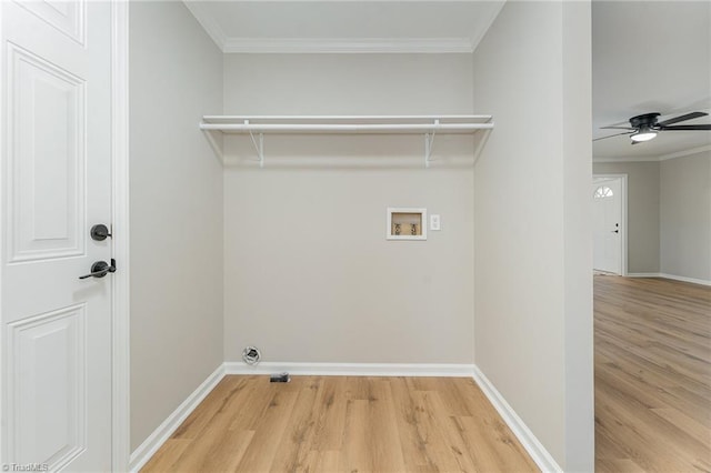 laundry room featuring ornamental molding, washer hookup, laundry area, and light wood-style flooring